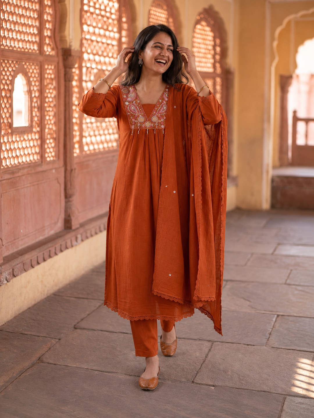 Rust Solid Cotton A-Line Pleated Kurta Set with Mirror & Threadwork Embroidery, V-Neck, Trouser & Pure Cotton Mirror Dupatta