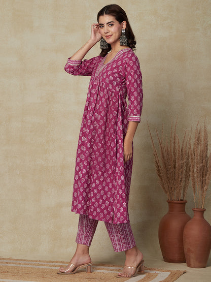 Ethnic & Stripes Printed & Embroidered A-Line Kurta with Pant - Purple