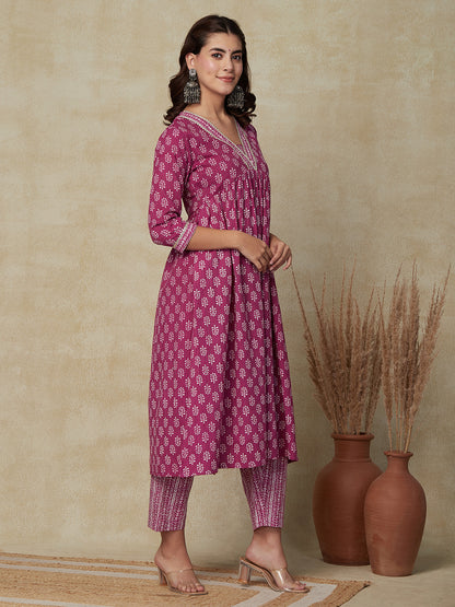 Ethnic & Stripes Printed & Embroidered A-Line Kurta with Pant - Purple