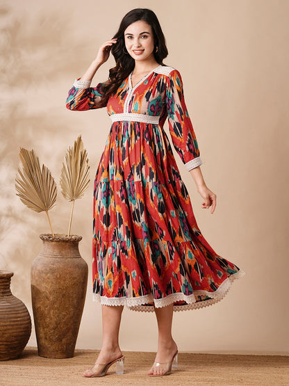 Abstract Ikat Style Printed Resham & Crochet Lace Embellished Dress - Red & Multi