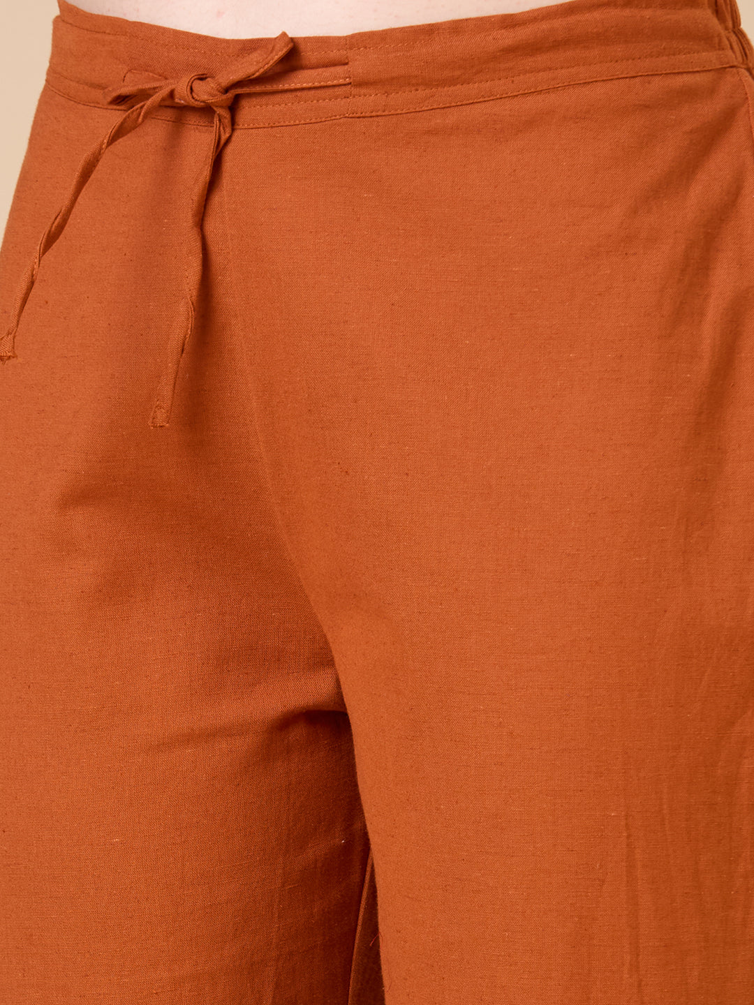 Solid Floral Embroidered A-line Kurta with Pant - Rust