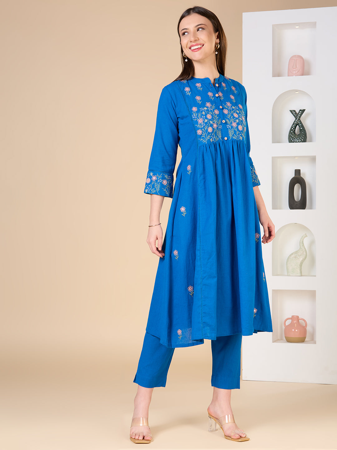 Solid Floral Embroidered A-line Kurta with Pant - Blue