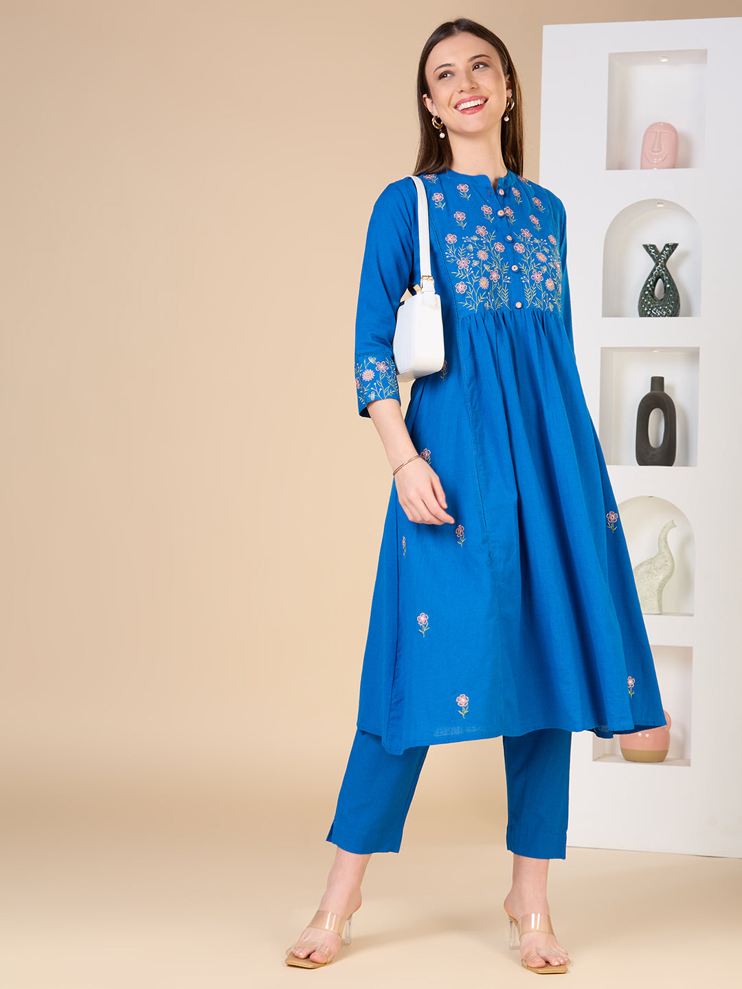 Solid Floral Embroidered A-line Kurta with Pant - Blue
