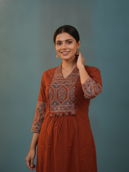 Rust Ajrakh Print Cotton A-Line Kurta Set with Embroidered Yoke, Pant & Dupatta