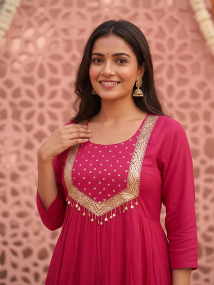 Fuchsia Solid Silk Blend A-Line Pleated Kurta Set with Hand Embroidery, Sequin Work, Pant & Tassel Dupatta