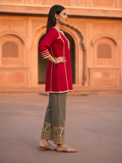 Maroon Solid Cotton A-Line Paneled Kurta Set with Gota Work, Round Neck & Chevron Printed Salwar