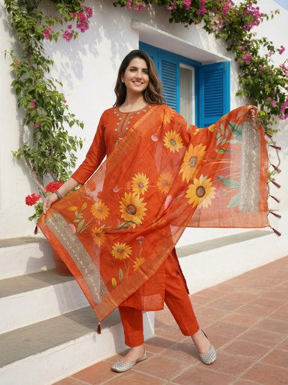 Rust Solid Muslin Silk Straight Kurta Set with Floral Hand Embroidery, Pant & Printed Poly Chanderi Dupatta