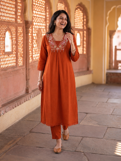 Rust Solid Cotton A-Line Pleated Kurta Set with Mirror & Threadwork Embroidery, V-Neck, Trouser & Pure Cotton Mirror Dupatta