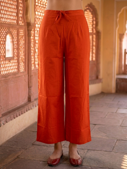 Rust Orange Solid Cotton A-Line Kurta Set with Foil Mirror Work, Threadwork Embroidery, Palazzo & Pure Cotton Tassel Dupatta