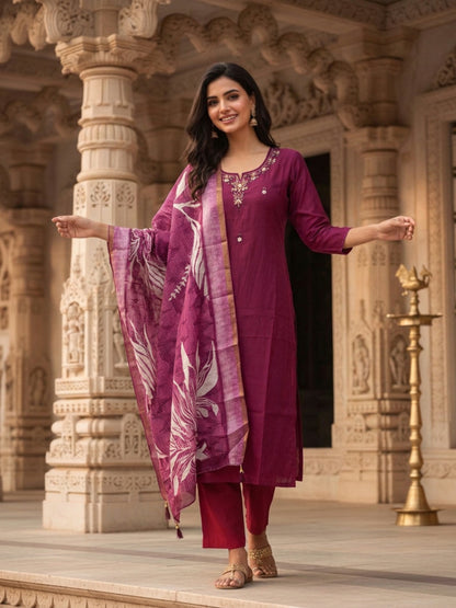 Burgundy Solid Muslin Silk Straight Kurta Set with Pearl & Threadwork Embroidery, Round Neck, Trouser & Poly Chanderi Self Design Tassel Dupatta