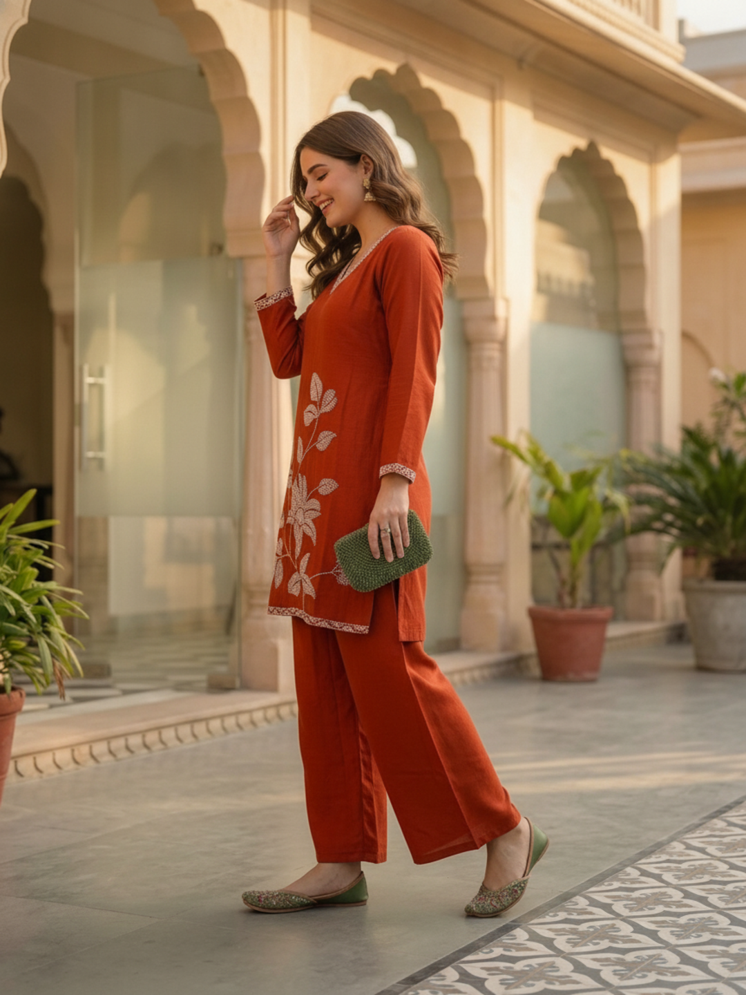 Rust Solid Crepe Straight Kurta Set with Floral Hand Embroidery & Sequin, Flared Palazzo & Taping Dupatta