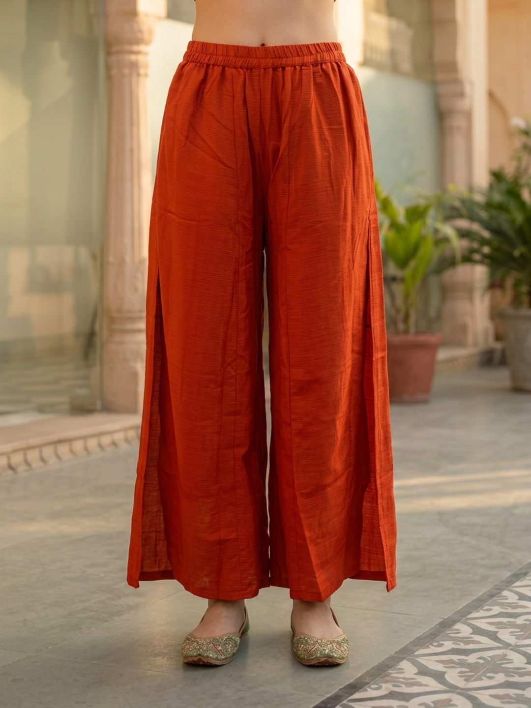 Rust Solid Crepe Straight Kurta Set with Floral Hand Embroidery & Sequin, Flared Palazzo & Taping Dupatta