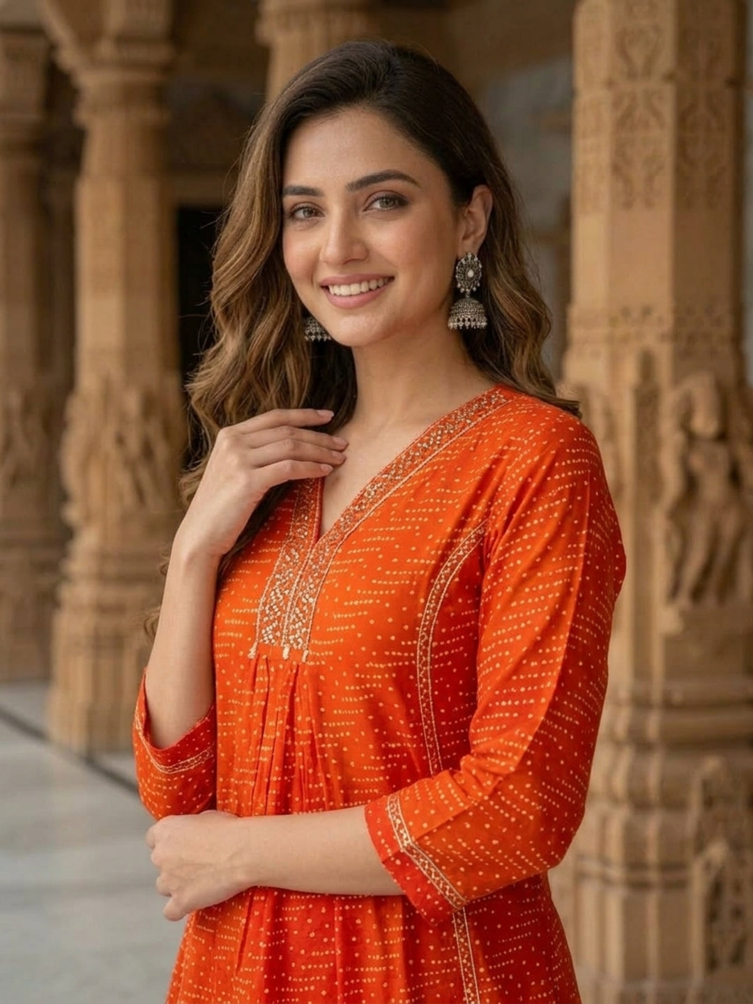 Model wearing rust Bandhani-print kurta set with solid trousers