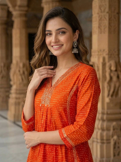 Model wearing rust Bandhani-print kurta set with solid trousers