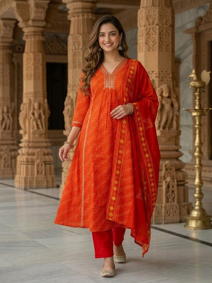 Close-up of the mirror-work V-neckline on the rust kurta