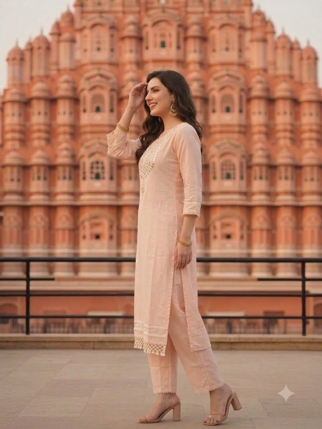 Side view of peach cotton A-line kurta with palazzos