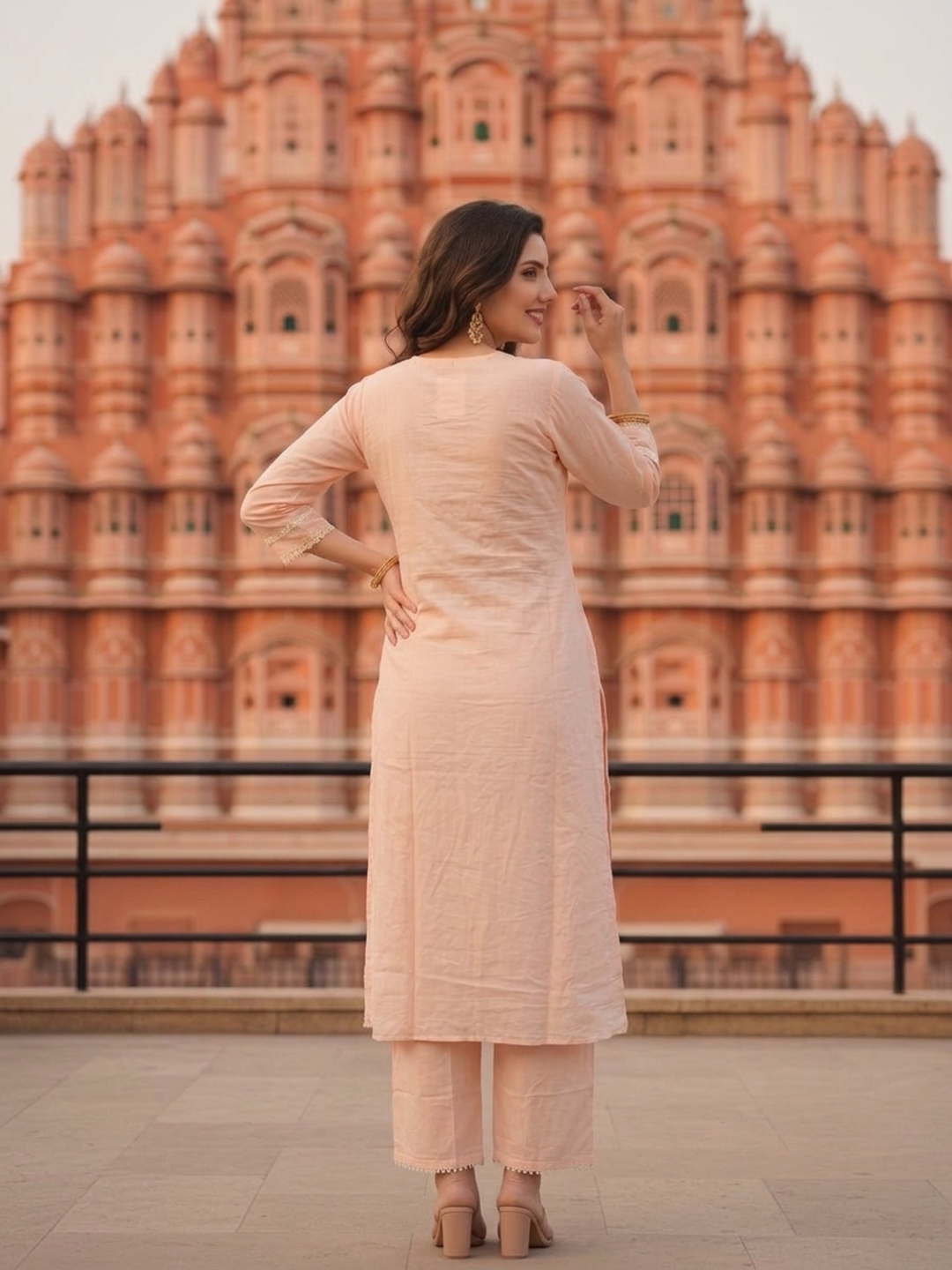 Model styling the solid peach pure cotton dupatta with the kurta set